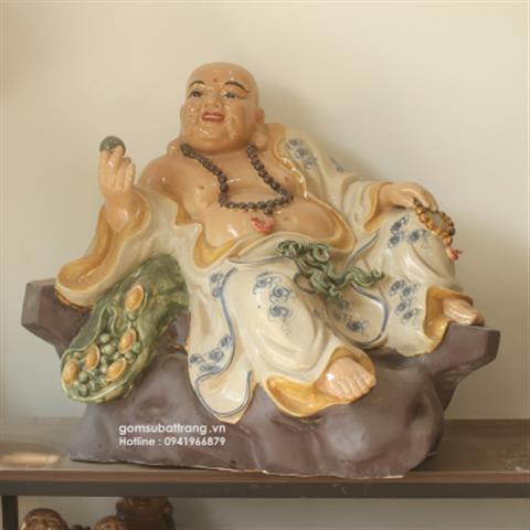 Tượng Phật Di Lặc ngồi gốc đào đẹp độc đáo 
