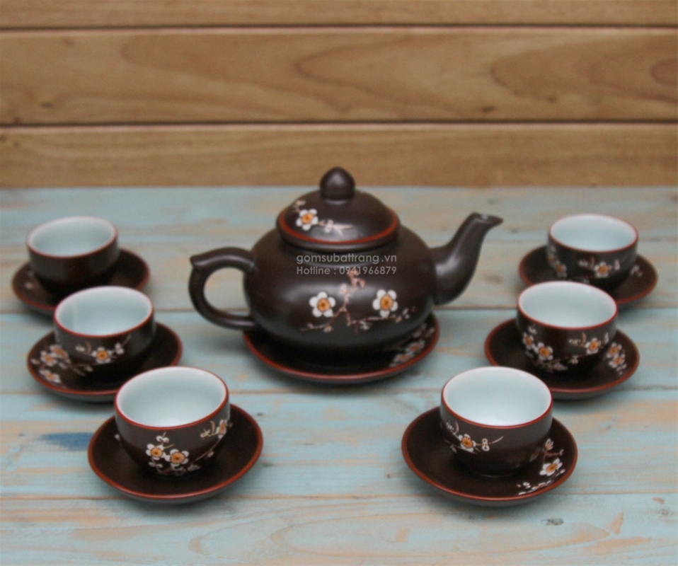 Bộ ấm chén dáng tròn men đen khắc chìm hoa đào